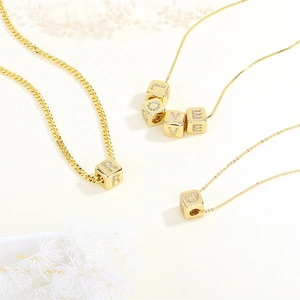 Gold-plated 18K copper cube letter charms with zircon inlay on assorted chain necklaces