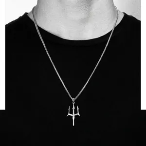 Silver trident pendant necklace for men with fine chain shown on black t-shirt