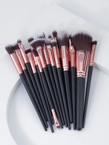 Detail of 20pcs professional makeup brushes with rose gold ferrules and soft gradient hair
