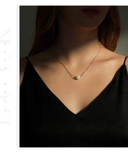 Elegant s925 sterling silver ball chain necklace featuring a white crystal pearl pendant