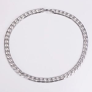 Detail shot of the polished silver stainless steel Cuban link chain with tight structure