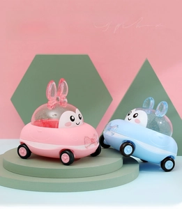 Retro big gift box with cartoon bunny toy cars in pink and blue pastel colors