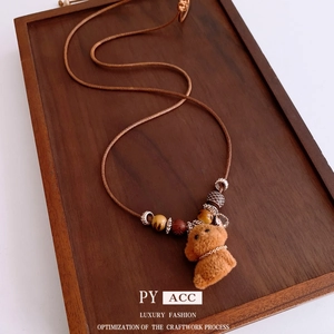 Retro brown flocked bear pendant necklace with wooden beads and adjustable cord