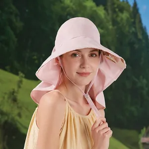Pink wide brim sun hat for women with neck flap protection and bow detail