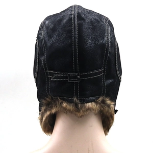 Faux leather winter trapper hat with brown faux fur lining and metal strap buckle