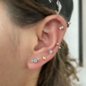 20G gold ear studs with lightning bolt and blue zircon stones for helix piercing