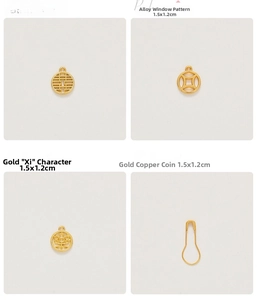 Detailed view of golden Chinese wedding alloy charms for candy box decoration 1.5x1.2cm