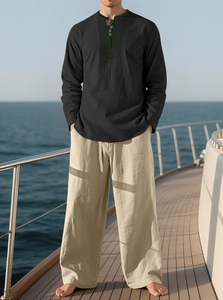 Men's linen leisure set featuring a black long-sleeved shirt and beige wide-leg pants