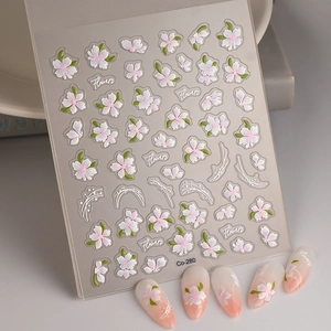 5D embossed cherry blossom nail stickers with floral patterns and pink gradient nails