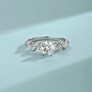 Elegant S925 silver moissanite ring with round solitaire diamond and leaf setting