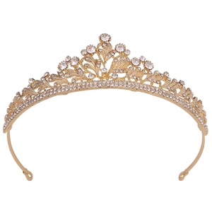 Elegant gold bridal crown featuring shimmering clear rhinestones and floral leaf patterns