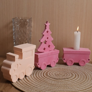 Train-shaped plaster candle holder set with locomotive and starry Christmas tree carriage