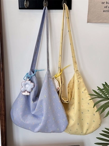 Floral cotton tote bags in blue and yellow plaid with small dots and cute charms