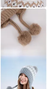 Detailed shot of knitted winter hat strings with fluffy soft faux fur pom-poms