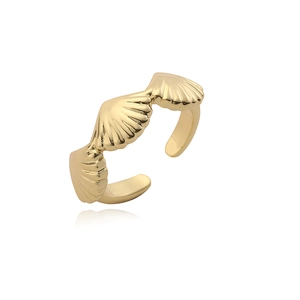 Detail of gold shell-shaped open ring with polished textured surface on white background