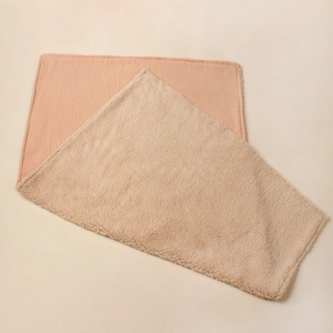 Thick double-layer baby blanket with pink cotton muslin and beige sherpa fleece lining