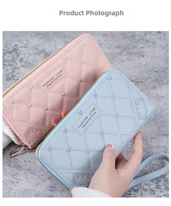 Detailed view of pink and blue quilted women's long wallets with cute bear embroidery