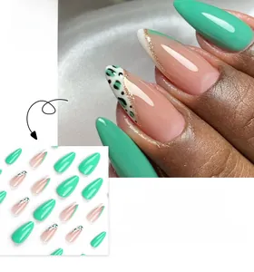Detail of almond-shaped press-on nails with mint green, gold glitter, and leopard print