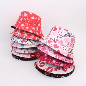 Pink and white graffiti love bucket hats with heart patterns for sun protection