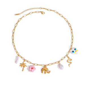 Gold chunky chain necklace with palm tree, pearl, shell and elephant pendants on white base