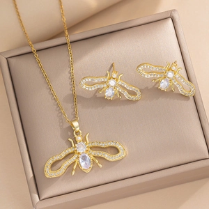 Elegantes goldenes Bienen-Schmuckset mit Zirkonia und Perlen in einer Geschenkbox