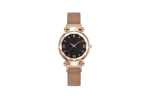 Detail of rose gold starry sky dial with Roman numerals and faceted glass watch face