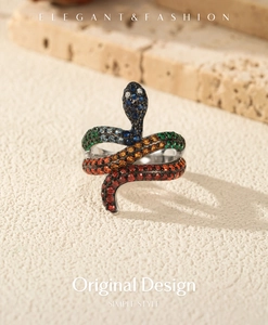 Close-up of S925 sterling silver snake ring with colorful zircon stones in macro view