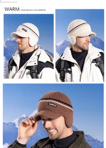 Detail view of winter knitted baseball cap with ear flaps in white and brown colors