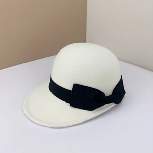 Elegant white wool felt equestrian hat with a black grosgrain ribbon and bow detail