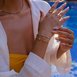 18K gold plated celestial jewelry set with pink zircon stars and moon bracelet on model