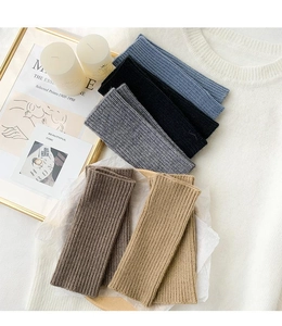 Detail of ribbed knit arm warmers in various colors like navy, black and khaki