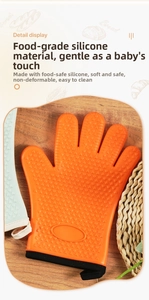 Detail view of non-slip heart pattern on silicone oven mitts with hanging loop