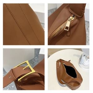 Detailed views of brown leather tote showing stitching, gold zipper and metal buckle