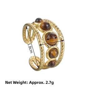Detailed view of triple-layered 18K gold ring with five natural tiger eye stones