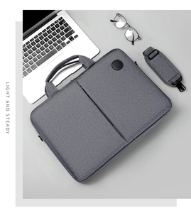 Gray business laptop bag with detachable shoulder strap and comfortable top handles