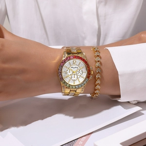 Women's gold watch and heart bracelet set with colorful crystal bezel and clear stones