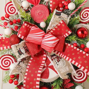 Christmas candy cane wreath with red ribbons, snowman patterns and green pine needles