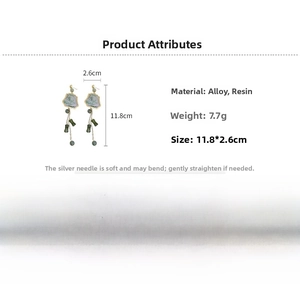 Detailed dimensions of long resin bamboo earrings showing 11.8 by 2.6 cm size