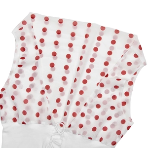 Detail of red polka dot chiffon splicing with ribbed knit and lace-up front design