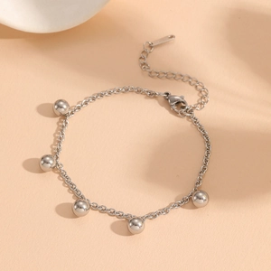 Close-up of silver bead chain bracelet with lobster clasp and adjustable extension chain