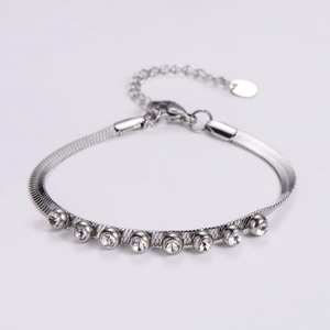 Silver stainless steel flat snake chain bracelet with eight round-cut clear crystals