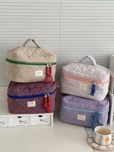 Quilted checkerboard cosmetic bags in multiple colors with top handle and dual zippers