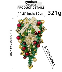 Detail of Christmas teardrop swag with ornaments, pine needles and Merry Christmas sign