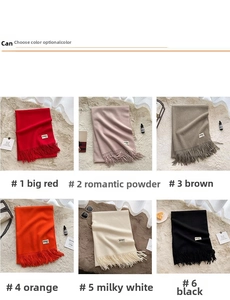 Macro shot showing six solid colors of fringed scarves with fine cashmere-like texture details