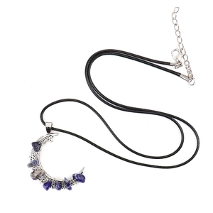 Handcrafted moon pendant necklace with blue raw stones and black cord strap