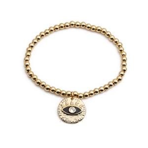 Golden beaded stretch bracelet with cubic zirconia evil eye pendant in a boho style