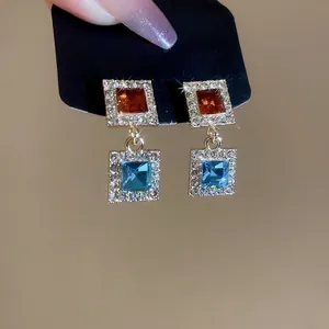 Boucles d'oreilles vintage françaises avec cristaux carrés orange ambre et bleu lac