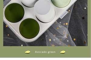 Detailed view of 6-piece avocado green makeup sponge set in a white plastic box