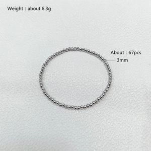 Detail showing 3mm steel beads bracelet weight 6.3g with 67 pieces on white background
