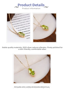 Macro view of S925 silver marquise green stone pendant with 18K gold plating